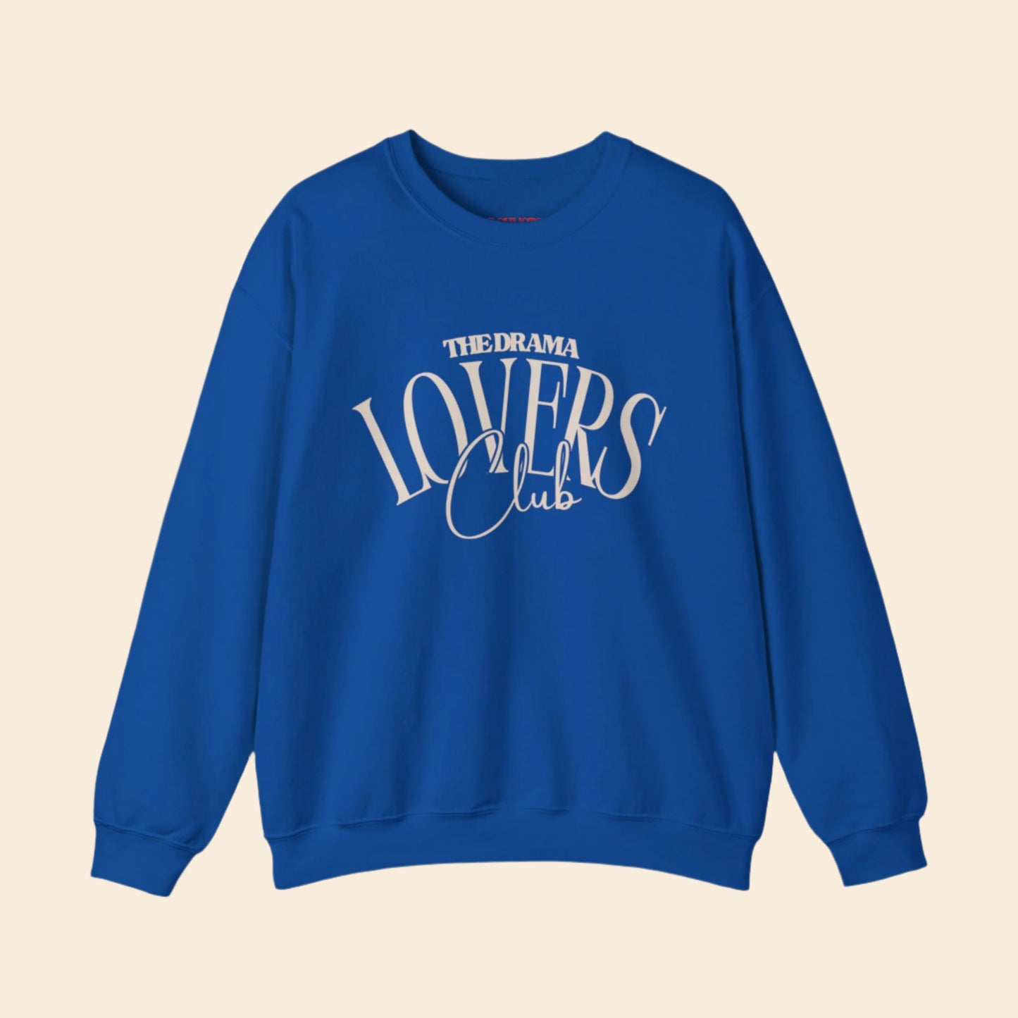 blue sweatshirt with 'The Drama Lovers Club' text, on a white background.
