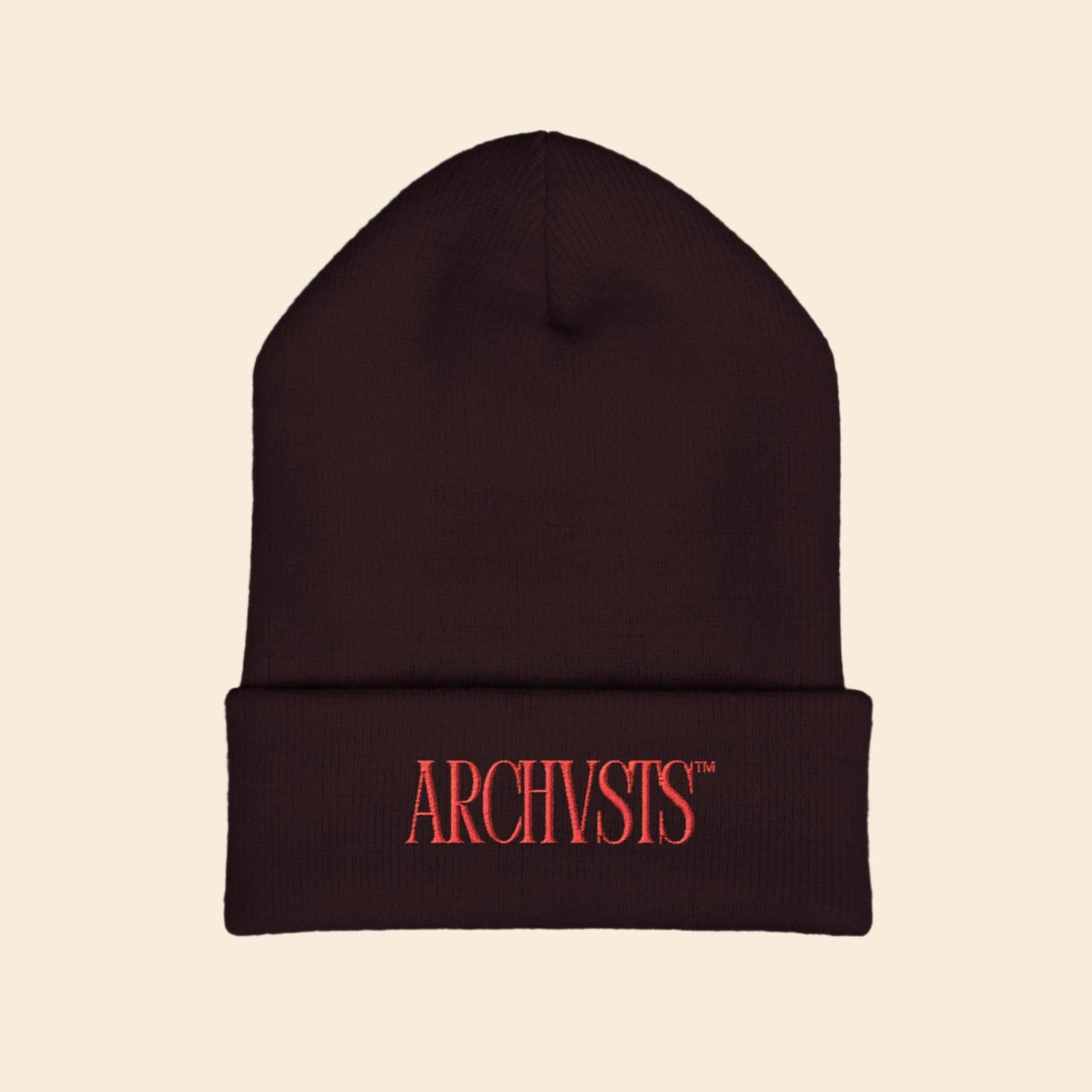 Brown beanie with red 'ARCHVSTS' logo on a white background