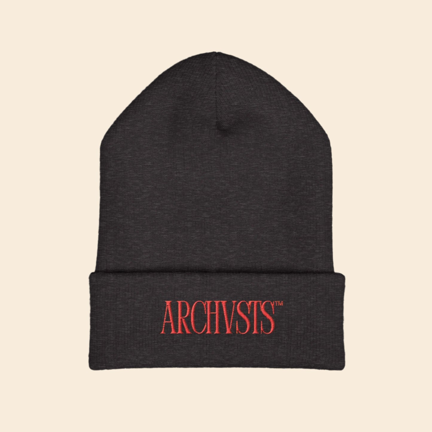 dark grey beanie with red 'ARCHVSTS' logo on a white background