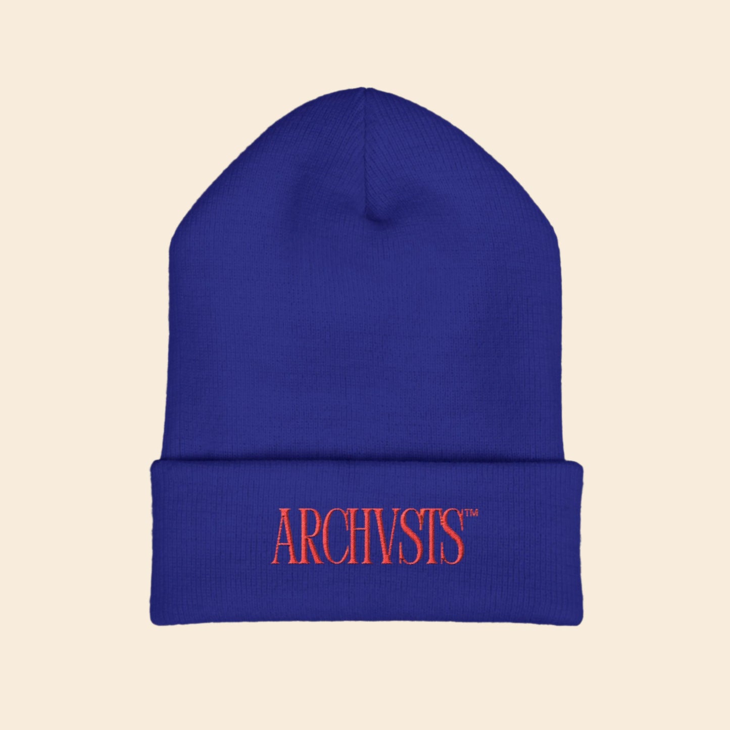 Blue beanie with red 'ARCHVSTS' logo on a white background