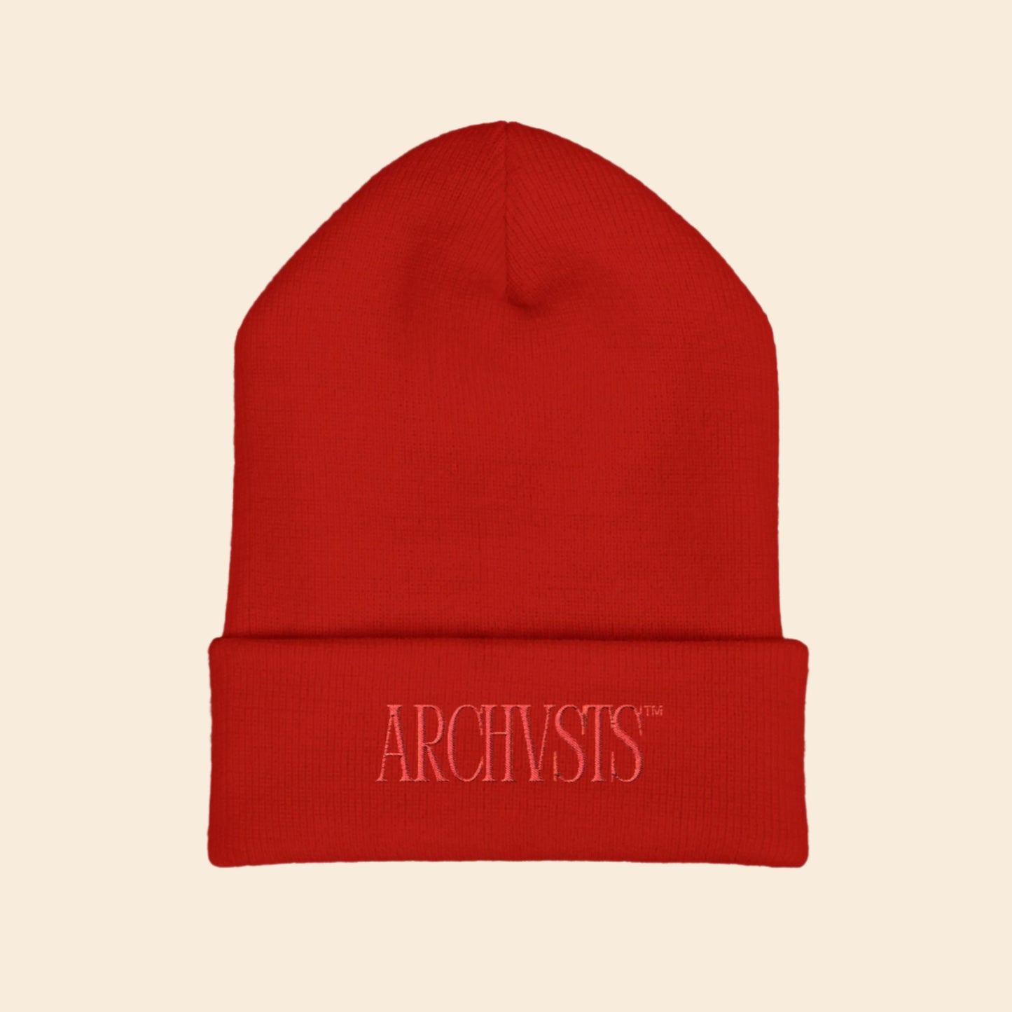 Red beanie with 'ARCHIVISTS' logo on a white background