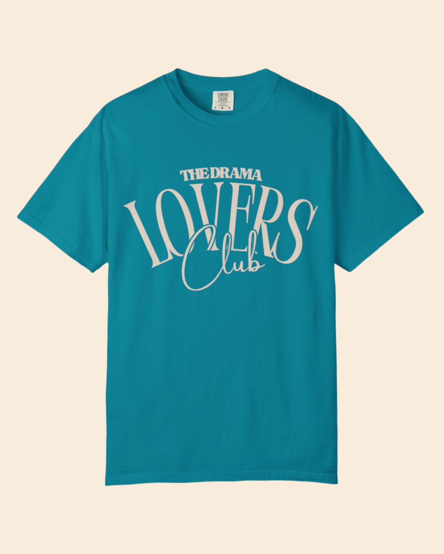 Teal t-shirt with 'THEDRAMA LOVERS Club' text on a white background