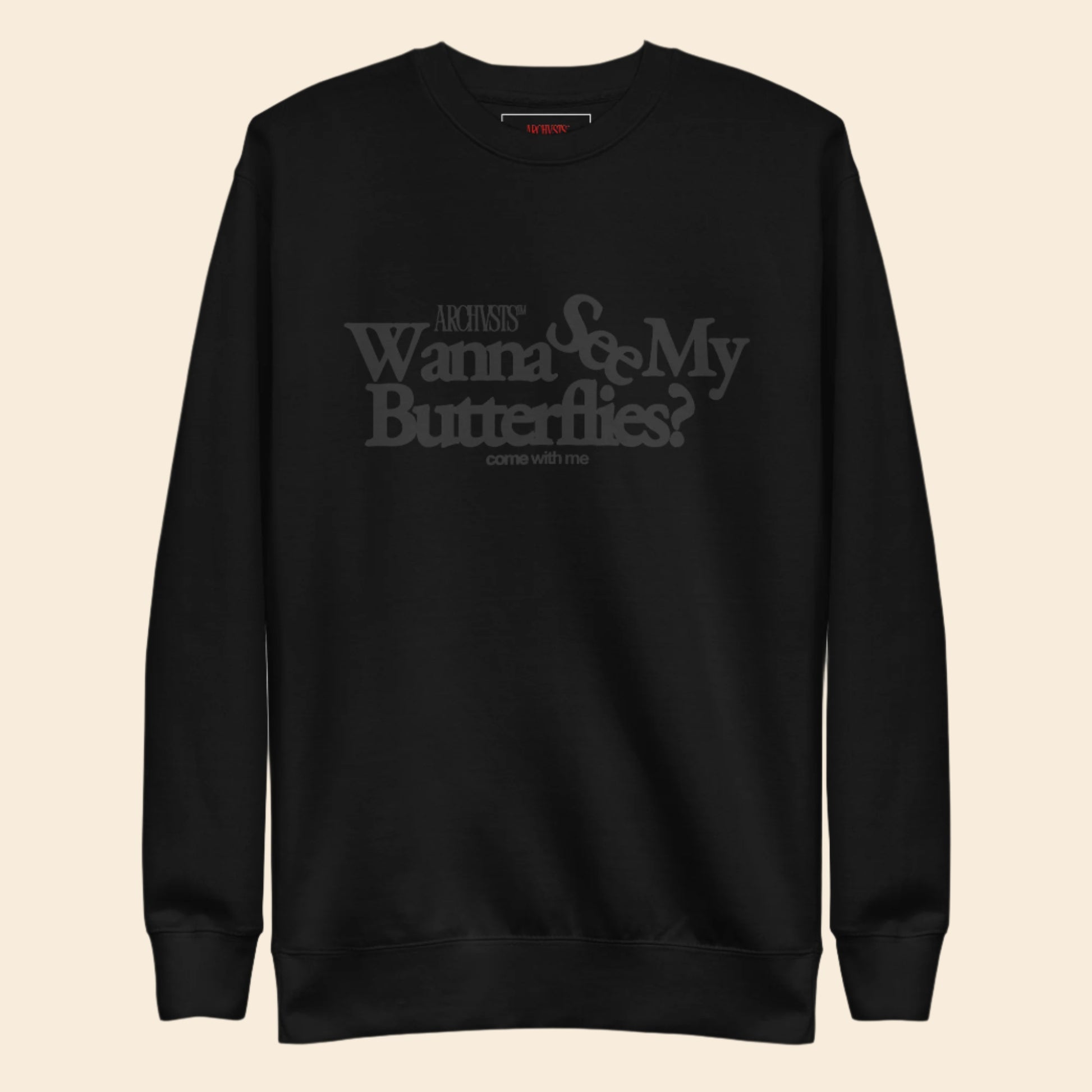 Black sweatshirt with text wanna see my butterflies on a white background