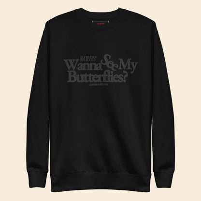 Black sweatshirt with text wanna see my butterflies on a white background