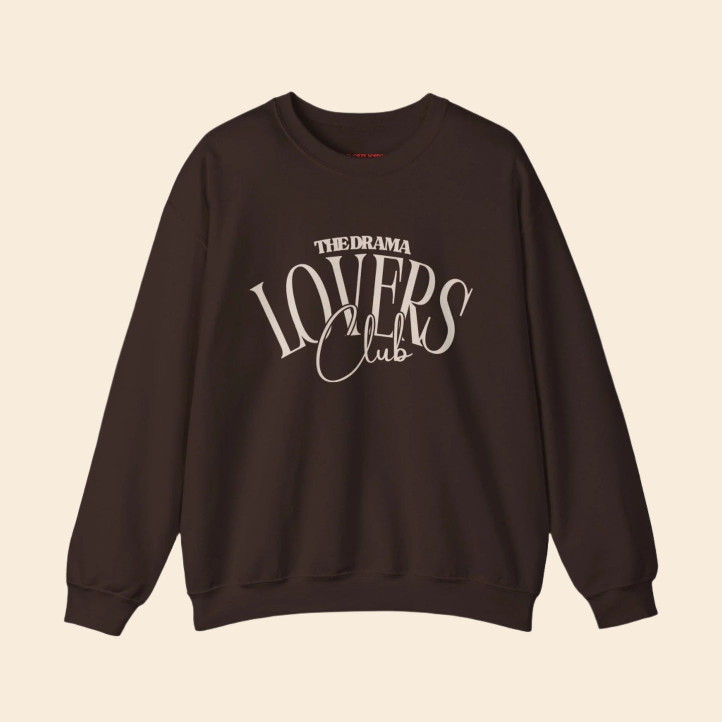 Brown sweatshirt with 'The Drama Lovers Club' text on a white background