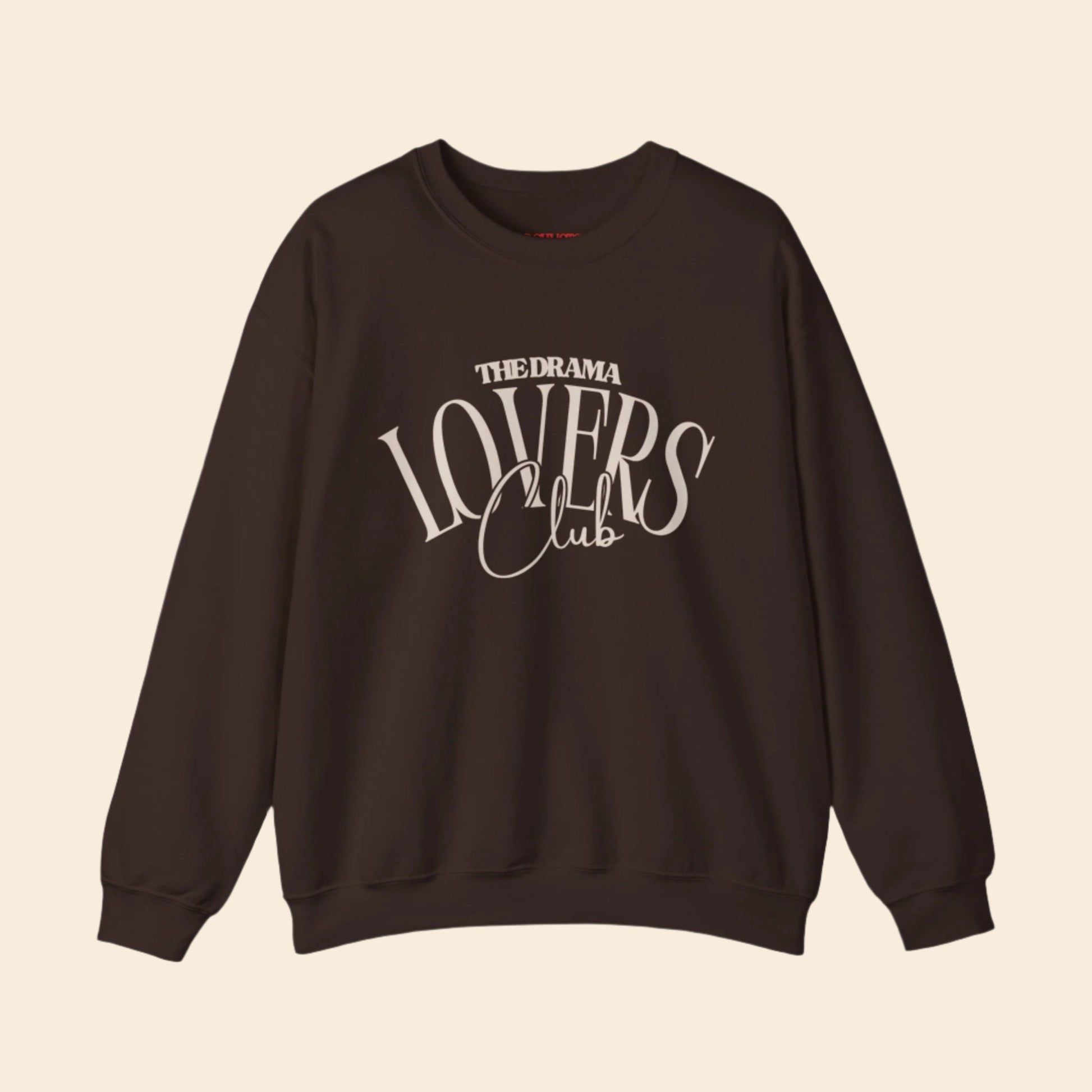 Brown sweatshirt with 'The Drama Lovers Club' text on a white background