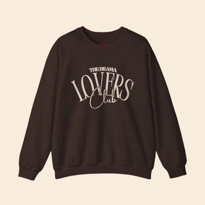 Brown sweatshirt with 'The Drama Lovers Club' text on a white background