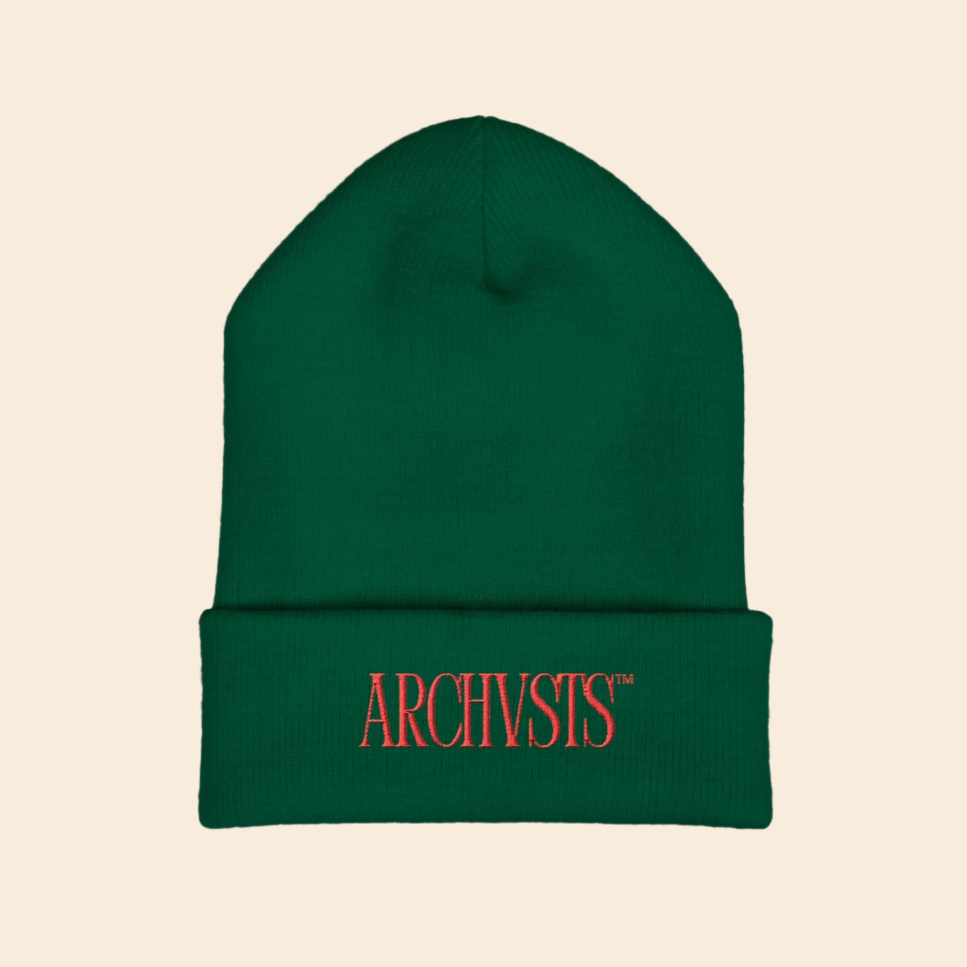 Green beanie with red 'ARCHIVSTS' logo on a white background
