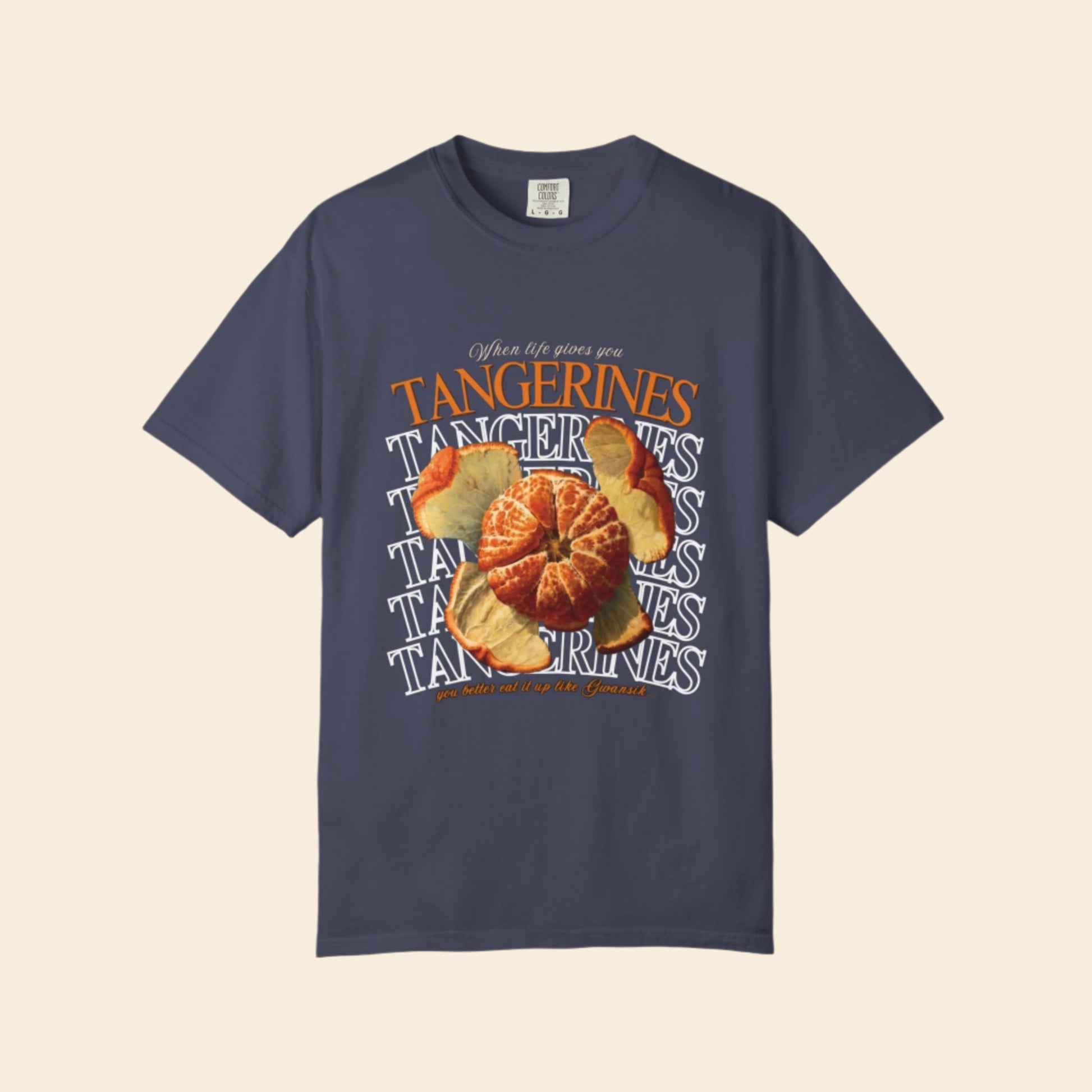 very pale Navy blue t-shirt with tangerine graphic and text on a white background