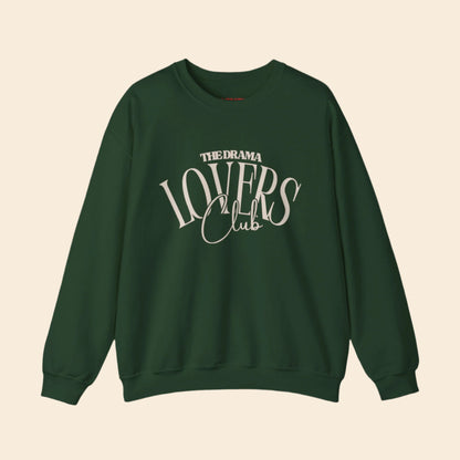 Green sweatshirt with 'The Drama Lovers Club' text on a white background