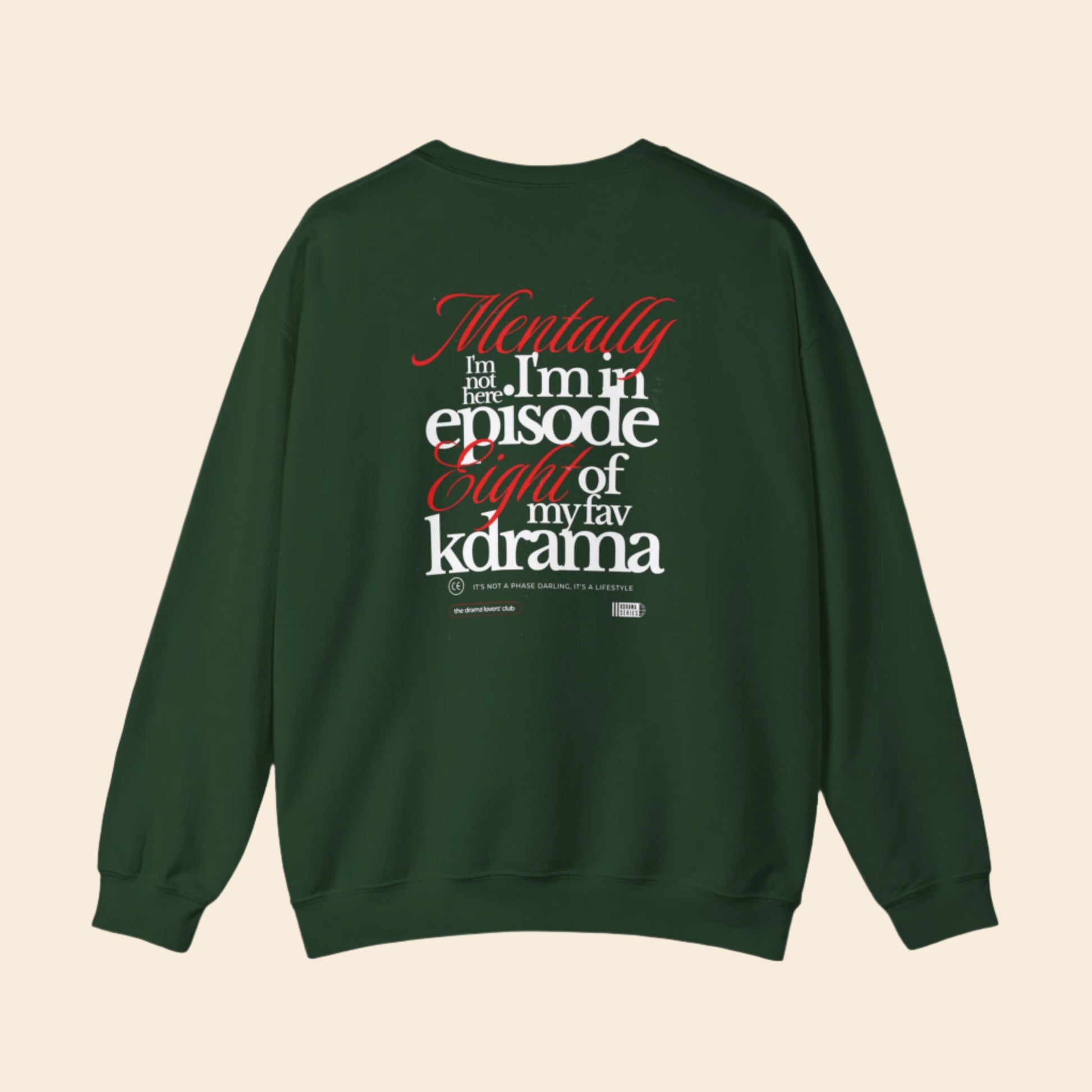 Green sweatshirt with text ARCHVSTS X MENTALLY SWEATSHIRT on the back on a white background