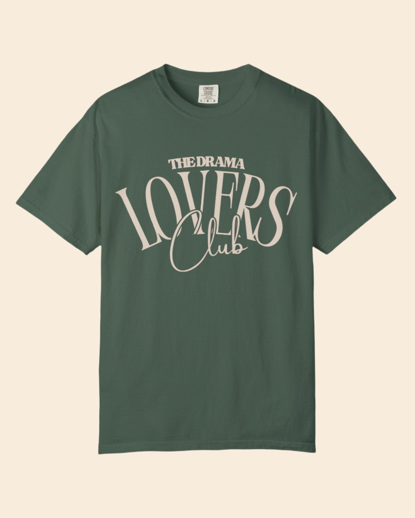Green t-shirt with 'The Drama Lovers Club' text on a white background