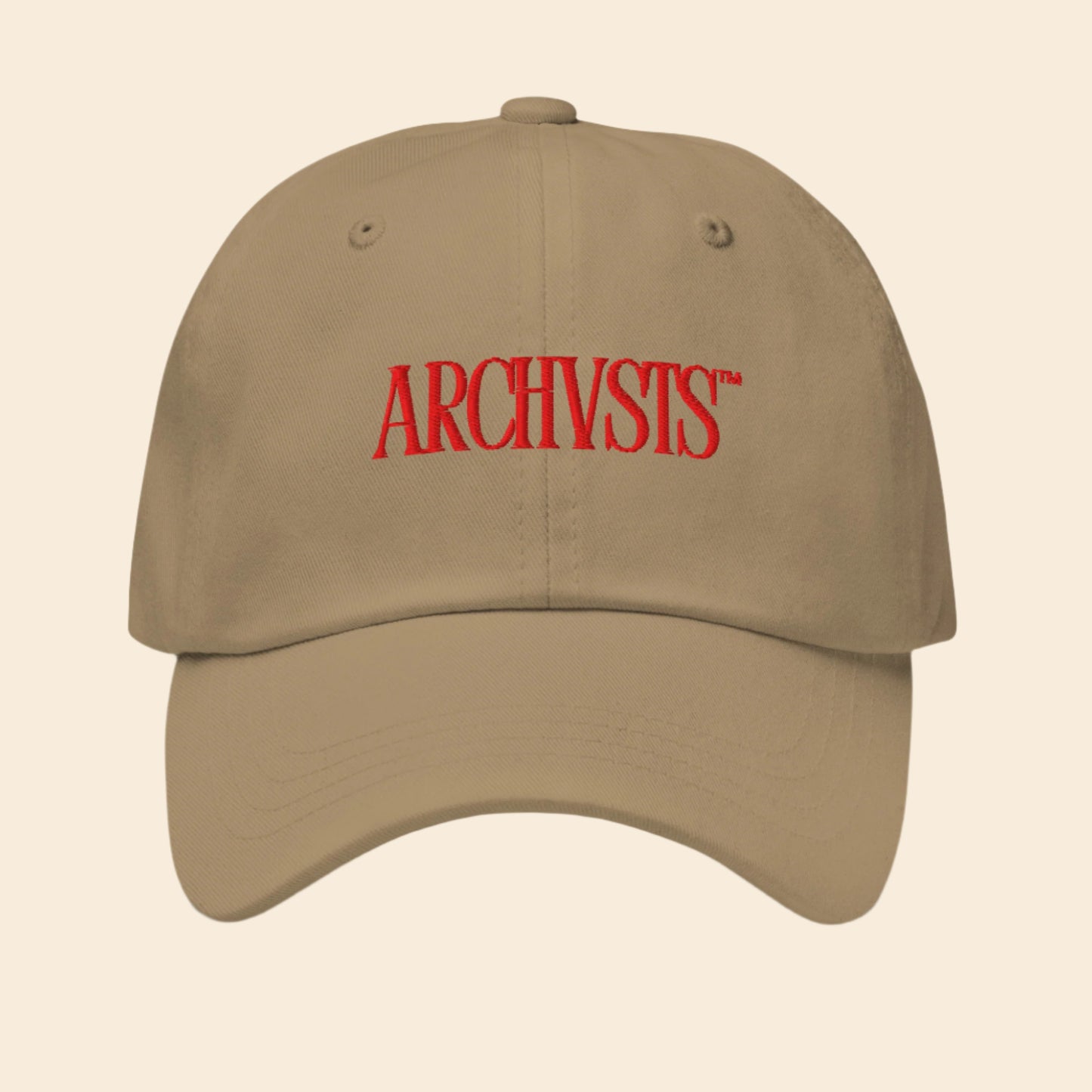 Beige khaki cap with red 'ARCHVSTS' logo on a white background