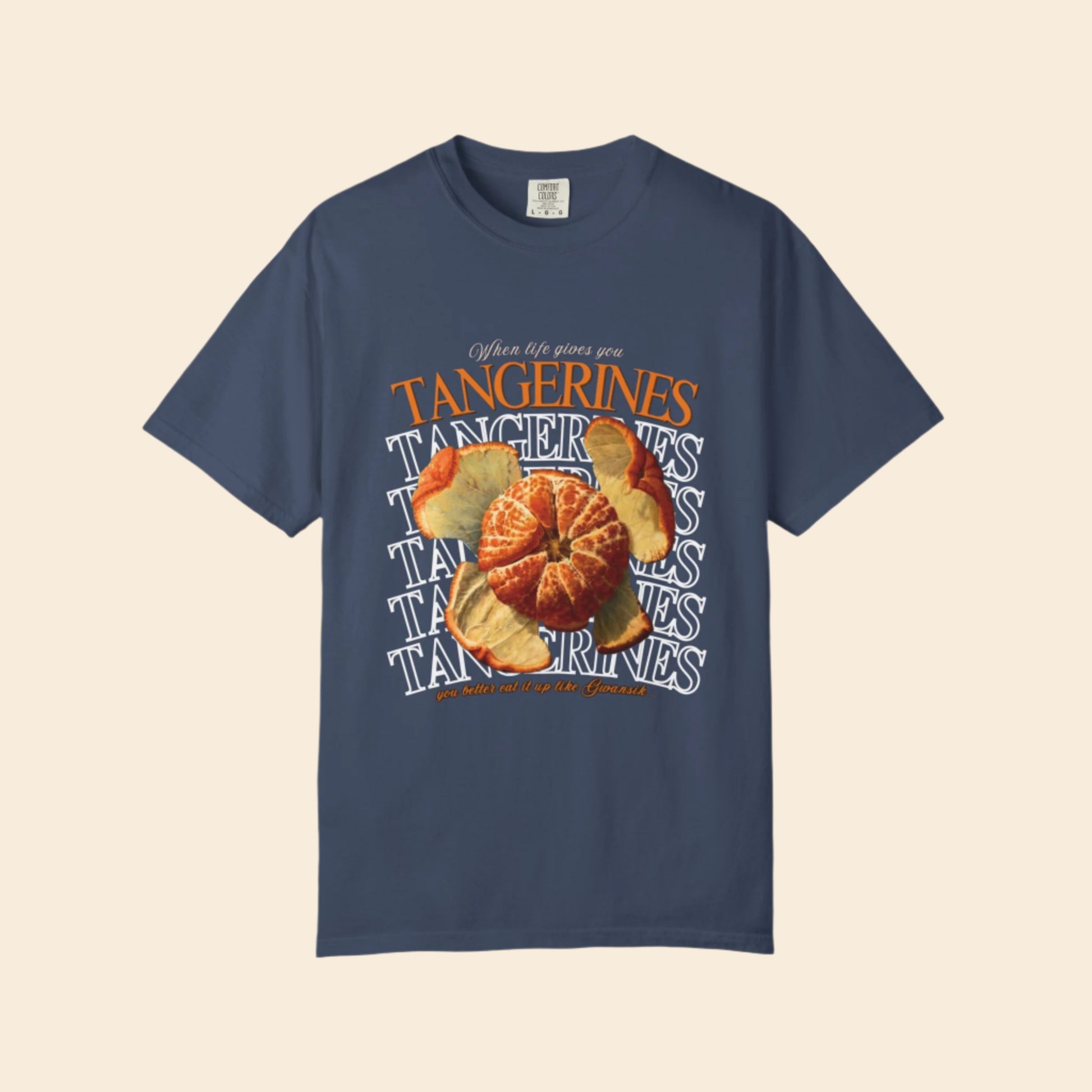 pale navy blue t-shirt with tangerine design and text on a white background