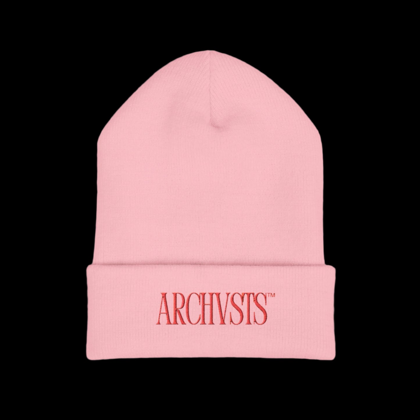 Pink beanie with 'ARCHIVSTS' logo on a white background