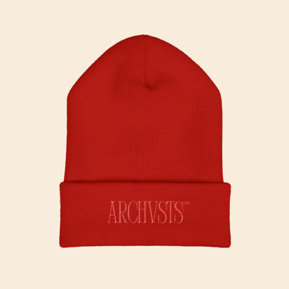 Red beanie with 'ARCHIVISTS' logo on a white background