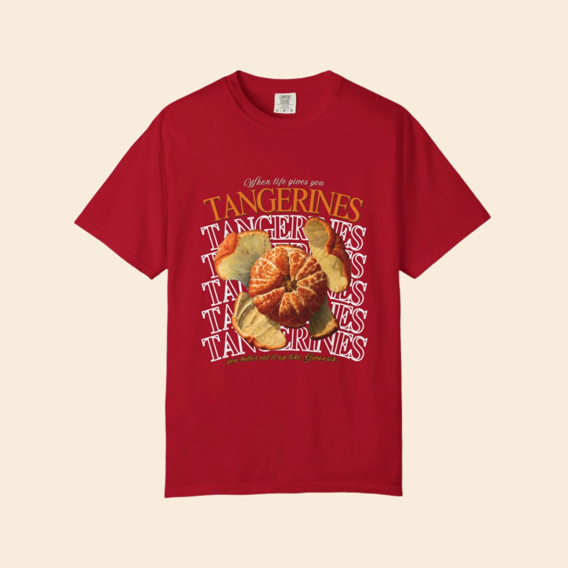 Red t-shirt with tangerine graphic and text on a white background