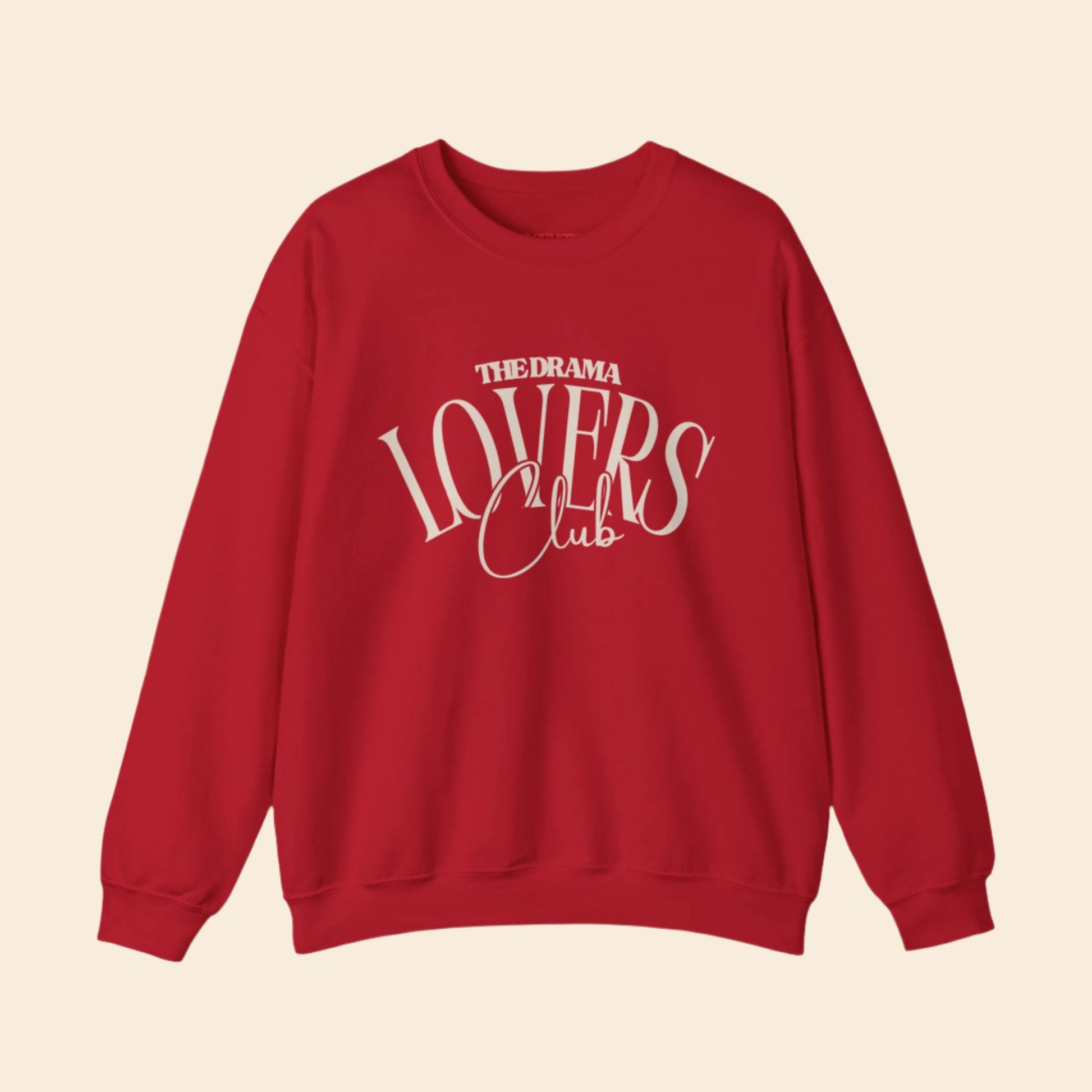 Red sweatshirt with 'The Drama Lovers Club' text on a white background