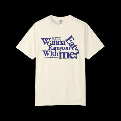 Beige t-shirt with blue text wanna eat ramyeon with me on a white background