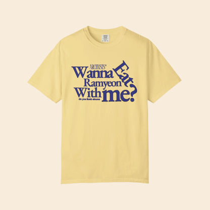 Yellow t-shirt with blue text wanna eat ramenyon with me on a white background