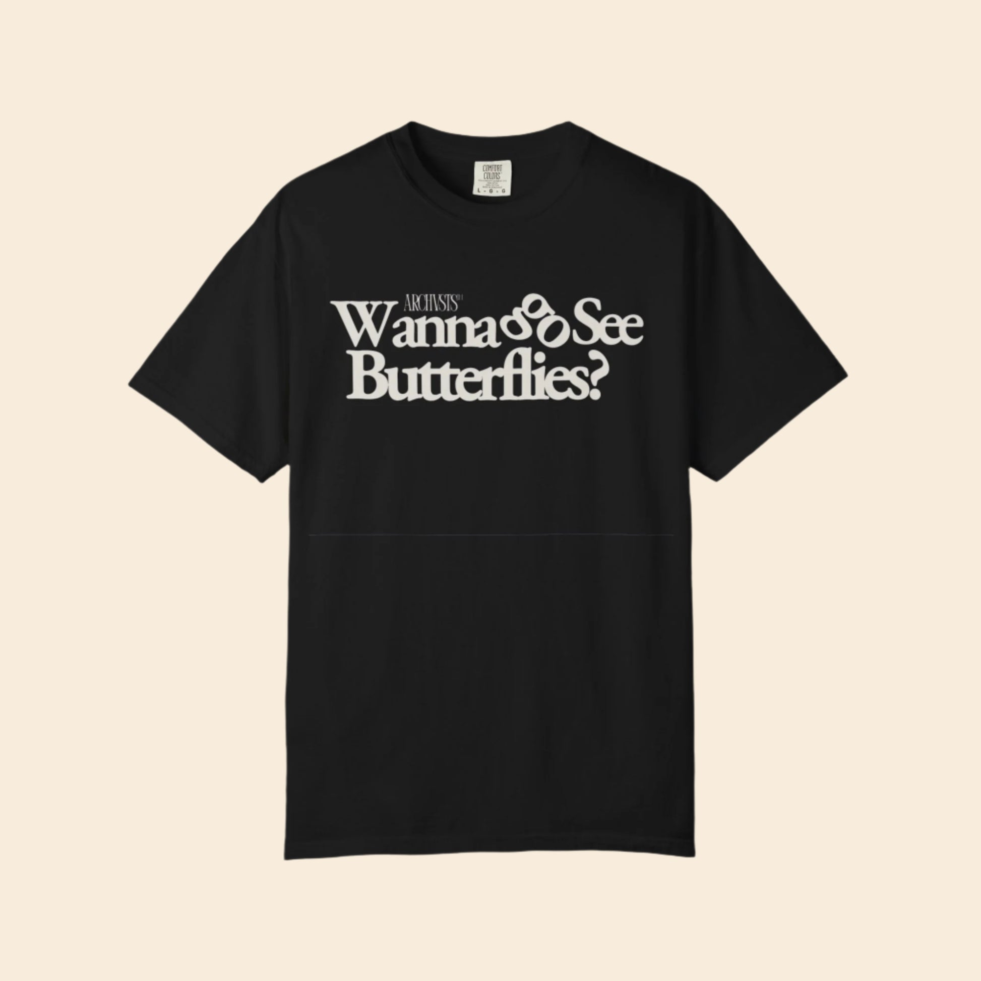 Black t-shirt with white text 'Wanna See Butterflies?' on a white background