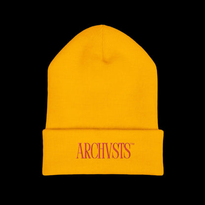 Yellow beanie with 'ARCHVSTS' logo on a white background